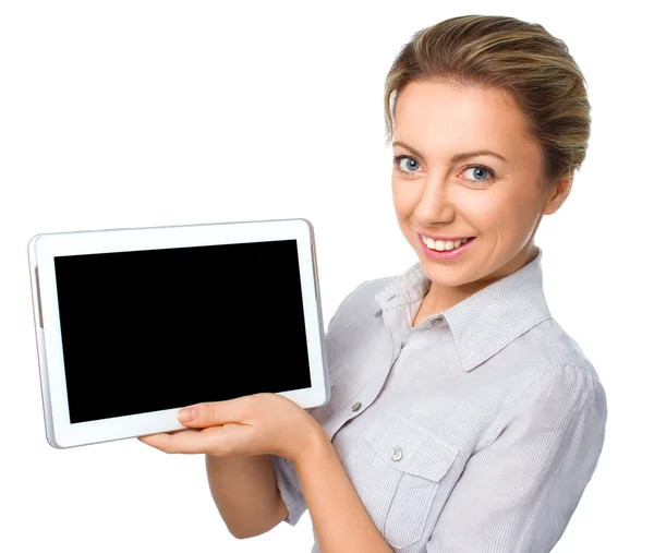 Young cheerful woman is showing blank tablet — Stock Photo, Image