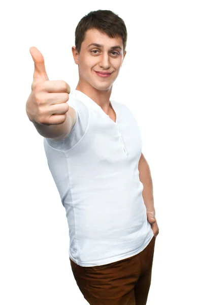 Ευτυχής χαμογελαστός τύπος που παρουσιάζει τον αντίχειρα επάνω χέρι σημάδι — Φωτογραφία Αρχείου