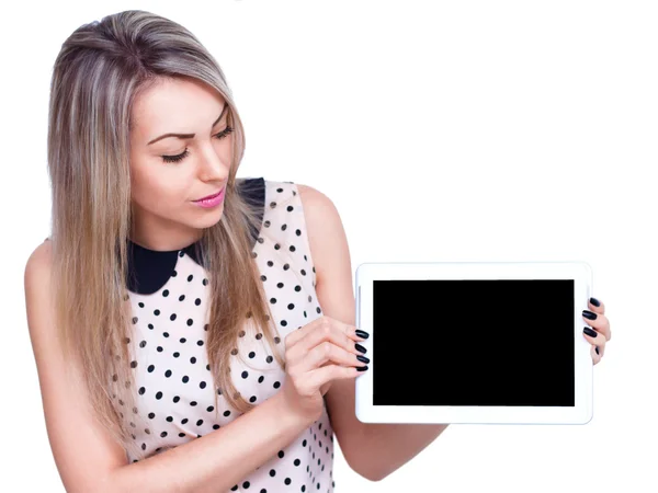 Young cheerful woman is showing blank table — Stock Photo, Image