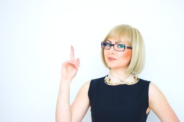 Closeup side view profile portrait of woman pointing and laughing