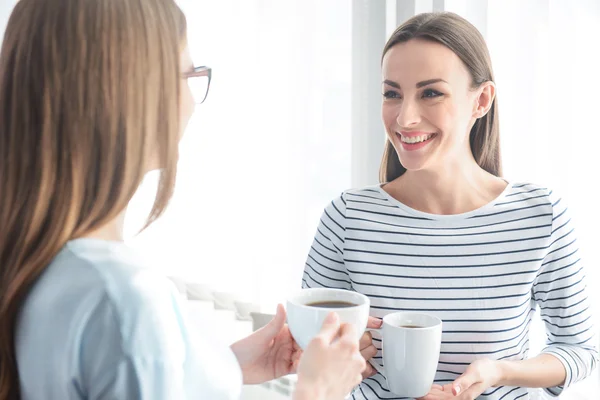 Positive friends having pleasant conversation — Stock Photo, Image