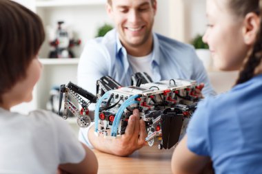 Positive father playing with kids