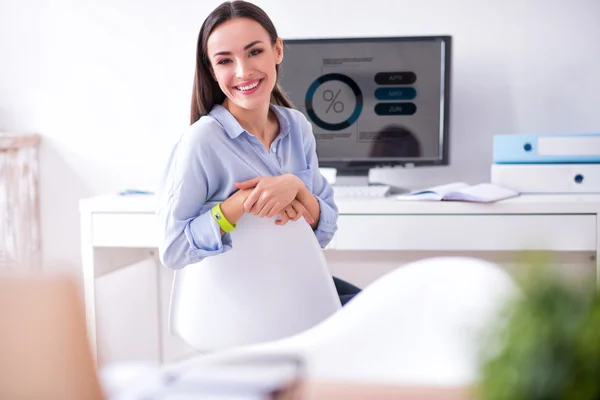 Nice woman sitting in the chair — Stock Photo, Image