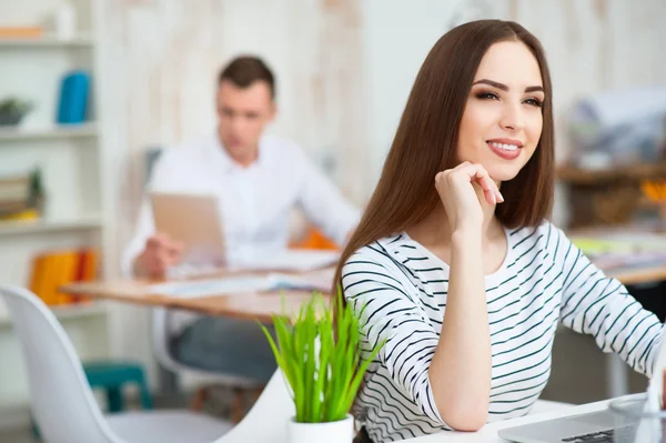 Positive woman working in the office — Stock Photo, Image