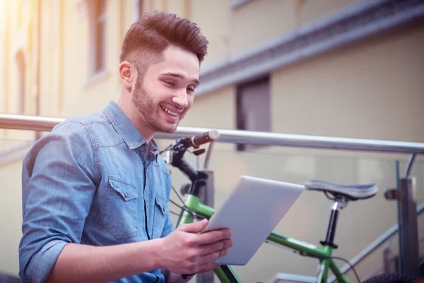 Delighted guy using tablet — Stock Photo, Image