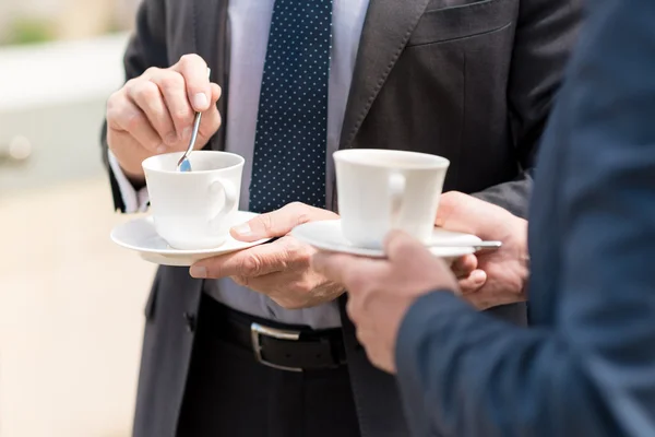 stock image Pleasant colleagues drinking coffee