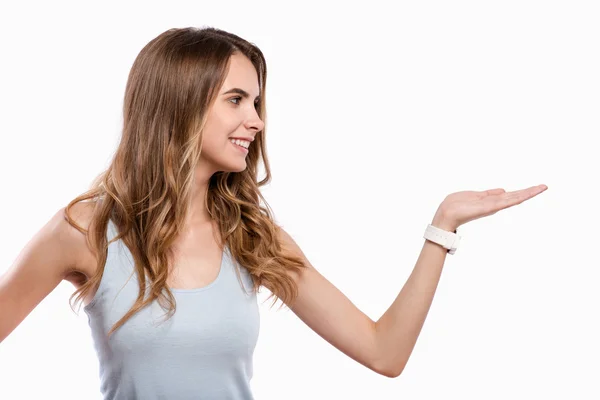 Positive delighted woman pointing left — Stock Photo, Image