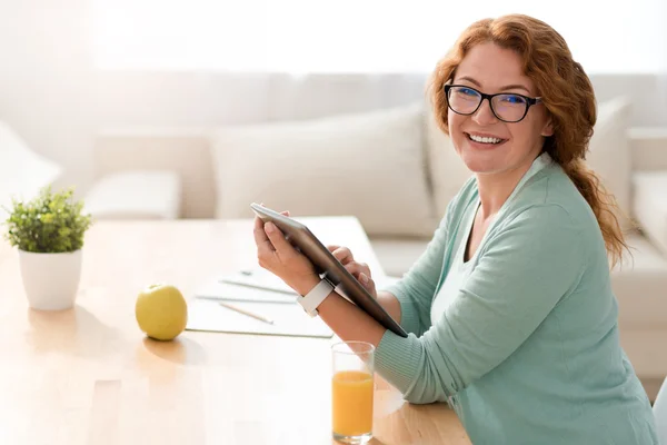 Positive woman working at home — Stock Photo, Image
