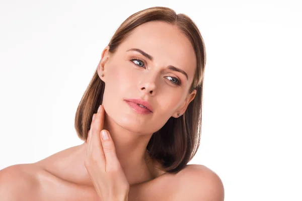 Beautiful young woman applying cosmetics — Stock Photo, Image