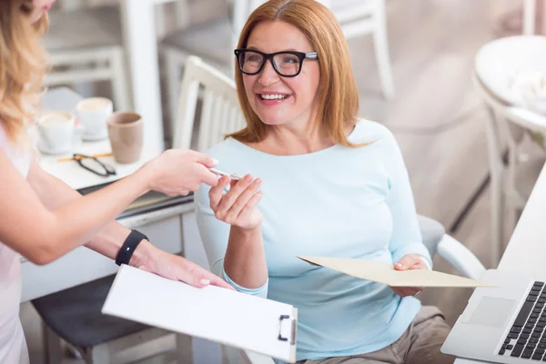 Positive senior woman getting a letter — Stock Photo, Image