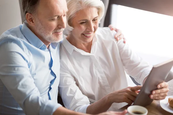 Pleasant loving couple resting in the cafe — Stock Photo, Image