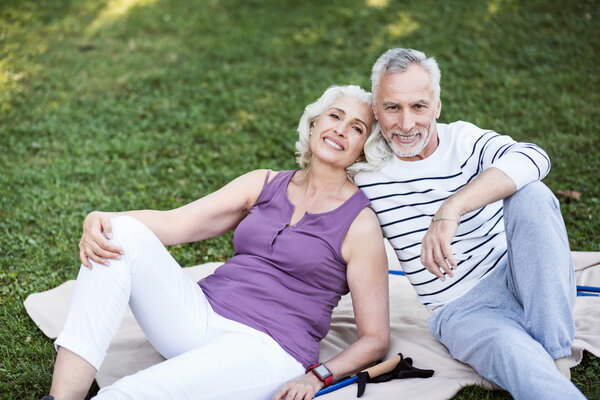 Very attractive elderly couple enjoying themselves in park