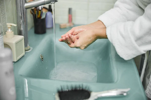 Female washing hands with foam at home — Stock Photo, Image