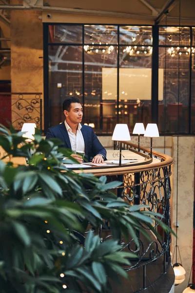 Dreamy male entrepreneur having a coffee break — Stock Photo, Image
