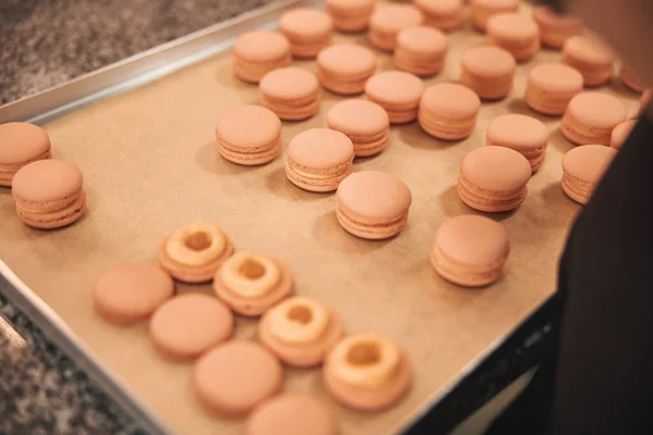 Tabletop display of bunch of delicious macaron desserts — Stok fotoğraf