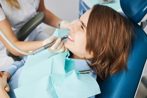Delighted kid feeling pleased with his dental operation — Stock Photo, Image