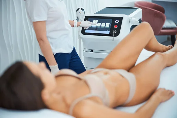 Certified dermatologist preparing a patient for a laser treatment — Stock Photo, Image