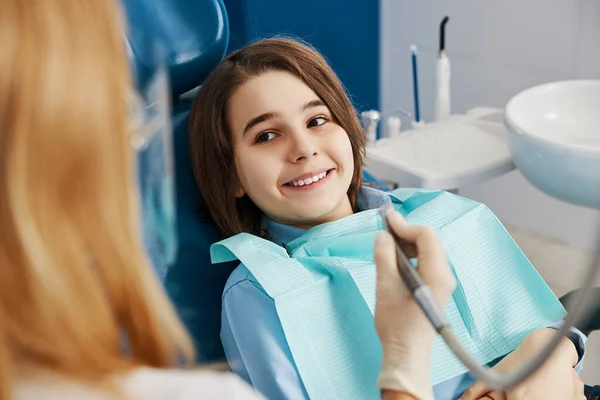 Calm boy waiting for a start of dental operation — Stock Photo, Image