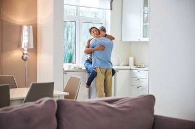 Tender female person enjoying her home day
