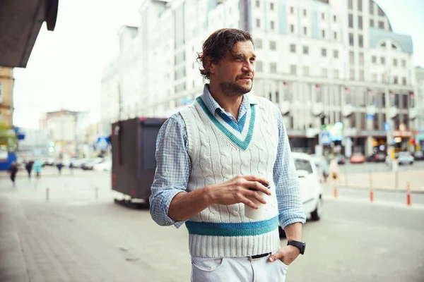 Handsome male person walking down the street — Stock Photo, Image