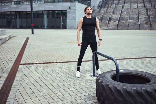 Concentrated brunette man doing exercise for breathing — Stock Fotó