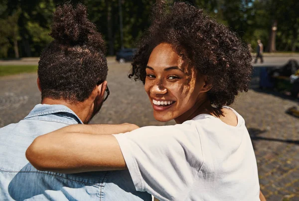 Lovely couple spending free time outdoors on sunny day — Stockfoto