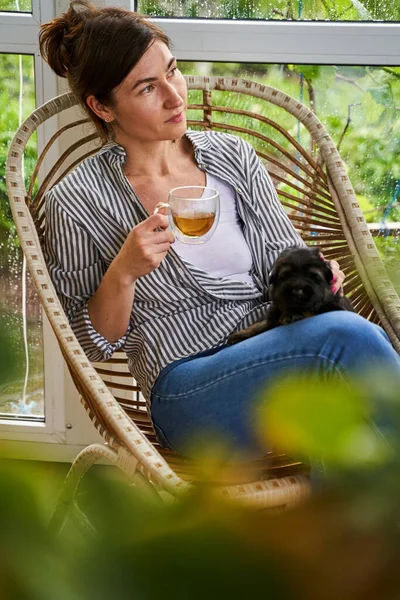 Cute female person holding cup of tea — Foto de Stock