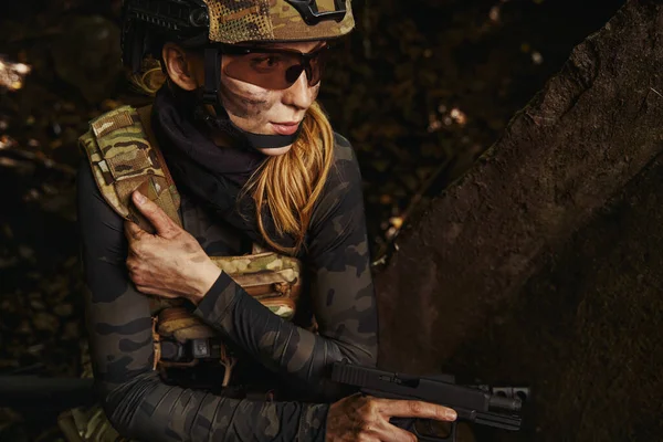 Serious woman holding hand firearms for shooting — Stock Photo, Image