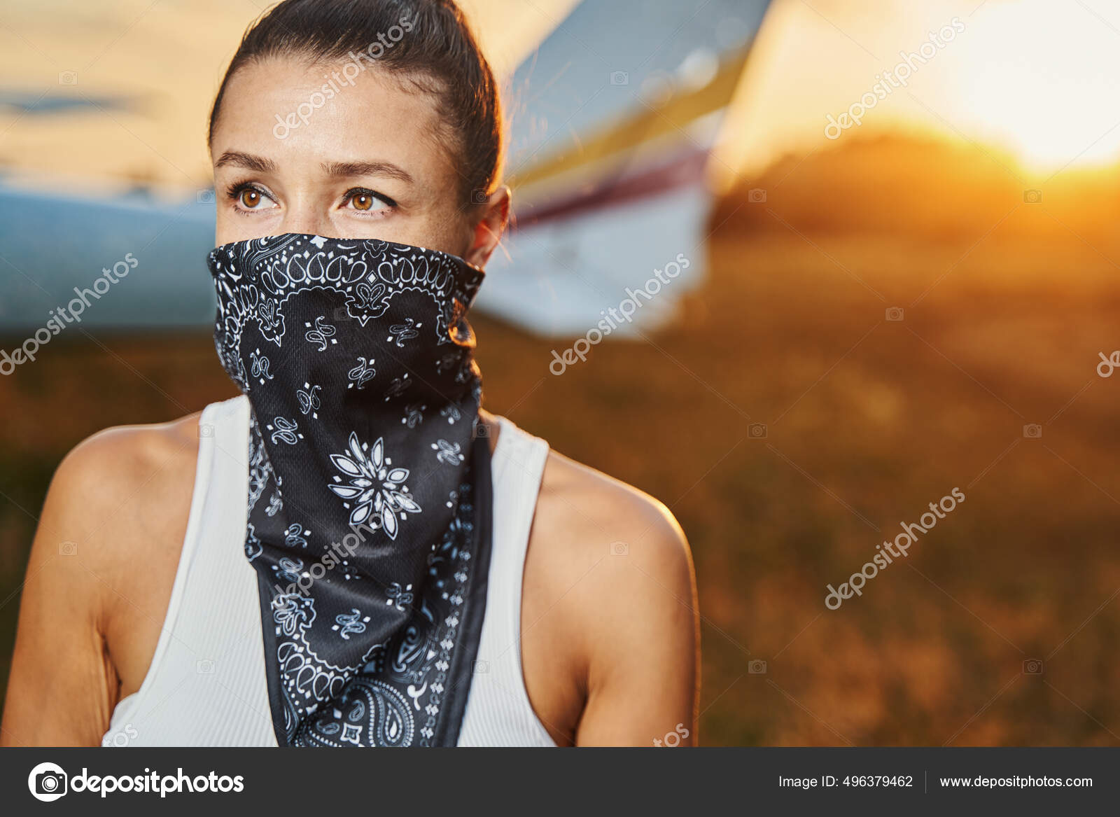 Portrait of kind woman covering her bandana Stock Photo by ©yacobchuk1 496379462