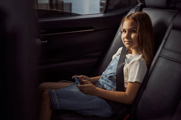 Mirthful kid feeling confident during the journey — Stock Photo, Image