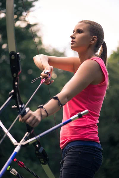 Woman with the bow — Stock Photo, Image