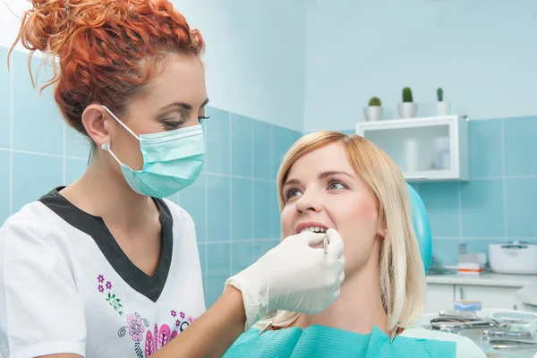 Work of dentist is not so easy — Stock Photo, Image