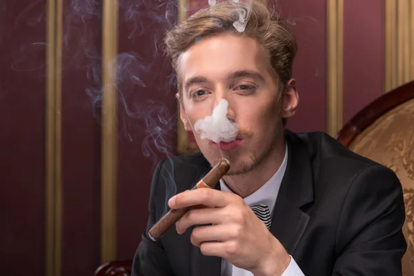 Handsome man with cigar — Stock Photo, Image