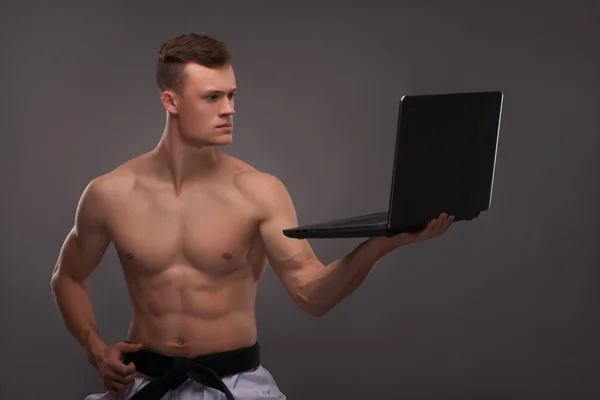 Handsome karate enthusiast — Stock Photo, Image