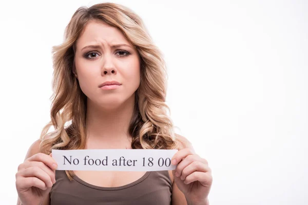 Portrait of young attractive woman holding warning notice card i — Stock Image Portrait of young attractive woman holding warning notice card i Royalty Free Stock Photos