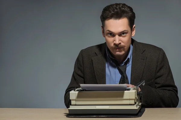 Inspired author working at the typewriter — Stock Photo, Image