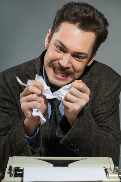 Inspired author throwing crumpled paper — Stock Photo, Image