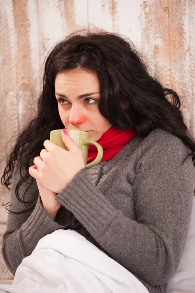 Frustrated sick girl with cup — Stock Photo, Image