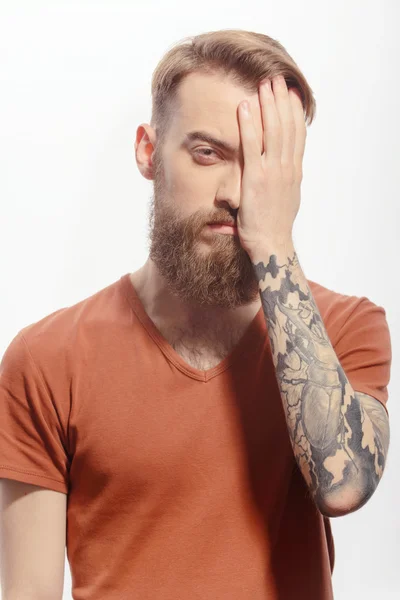 Handsome bearded man with headache — Stock Photo, Image