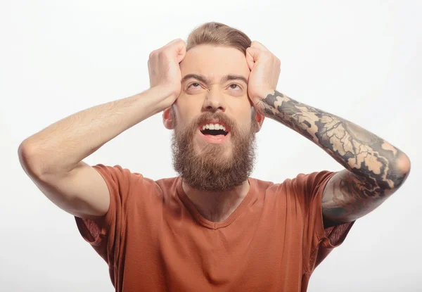 Handsome bearded man with headache — Stock Photo, Image