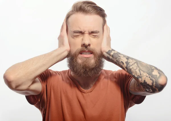Handsome bearded man with headache — Stock Photo, Image