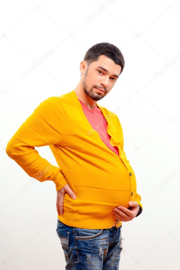 Conceptual image of a pregnant man Stock Photo by ©yacobchuk1 64525267