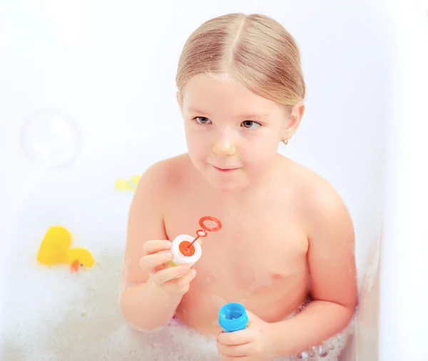 Cute little girl in the bathroom — Stock Photo, Image