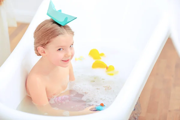 Cute little girl in the bathroom — Stock Photo, Image