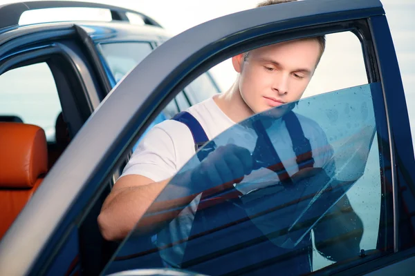 Car wrapping specialist in the station — Stock Photo, Image