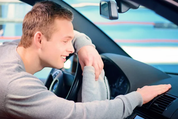 Handsome man cleaning his car — Stock Image Handsome man cleaning his car Royalty Free Stock Photos