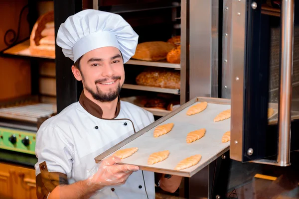 Handsome cook in the kitchen — Stock Photo, Image