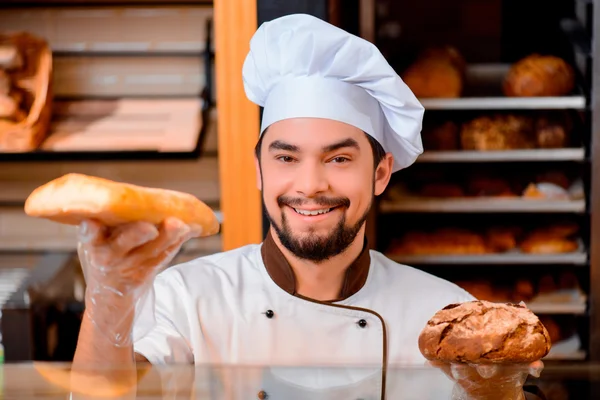 Handsome cook in the kitchen — Stock Photo, Image