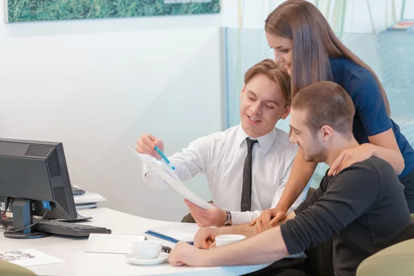 Couple communicating with a salesman