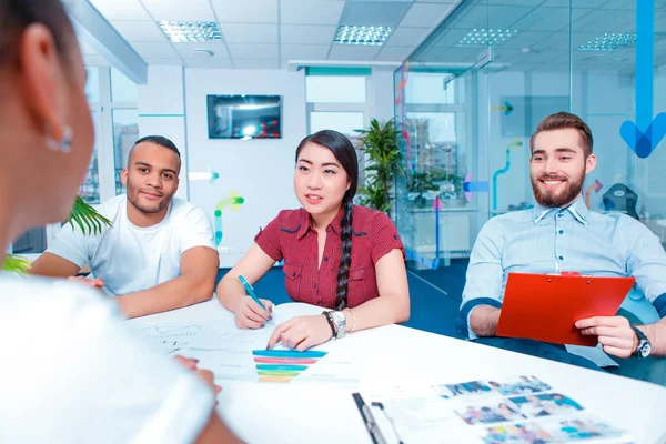 Young creative people at brainstorming — Stock Photo, Image